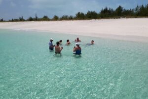 4 Hour Private Catamaran Sail and Snorkel from Grace Bay Beach, Providenciales - Grace Bay Beach boarding: the day starts easy
