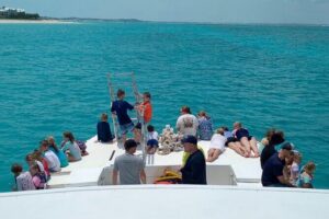 Group Reef, Beach and Sandbar Tour from Providenciales - Stop 1 at Grace Bay Beach: Reef Time and First-Thought Snorkeling