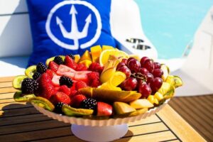 Sunset Dinner Cruise Private Group - The boat setup: wet bar, sunpads, and room to move