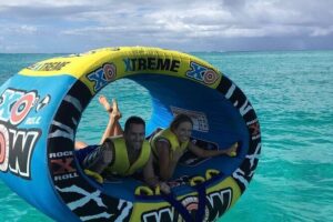 Wow Extreme Tube on Gracebay Beach Turks and Caicos Islands - The riding setup: life jackets, lying down, and holding on